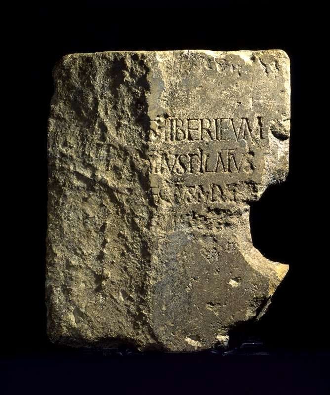 Stone with latin on it 